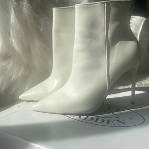 Steve Madden boots. Light wear. Style your favorite dress or a pair of jeans!